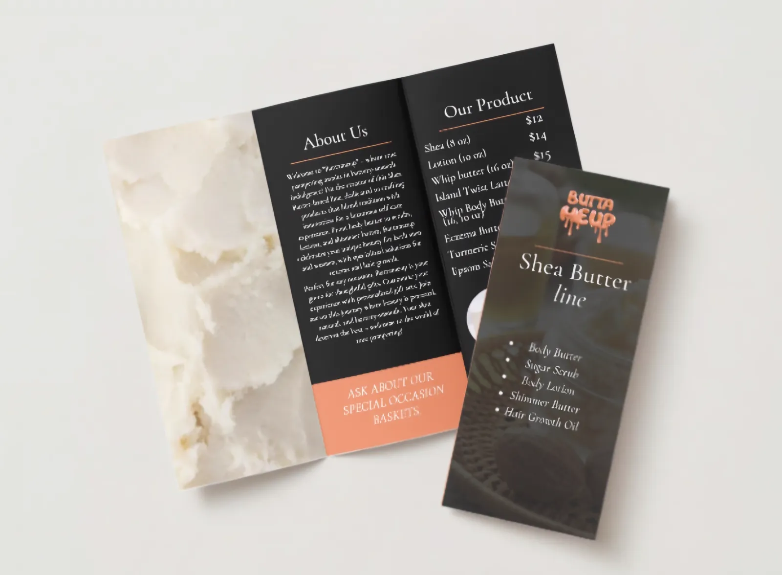 An open shea butter tri-fold brochure with a dark Butta Me Up rack card listing the Shea Butter line laid on top.